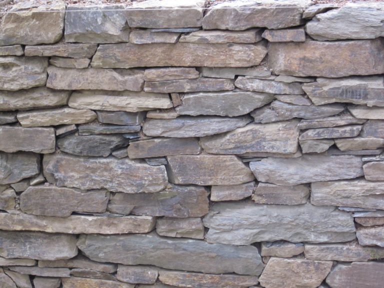 Natursteinmauer aus Feldstein - Galabau Wiegand