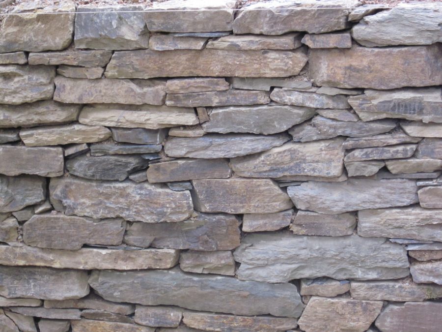 Natursteinmauer aus Feldstein Galabau Wiegand